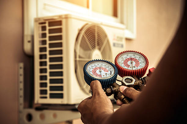 Professional Hvac technician working in Valley Grove, WV